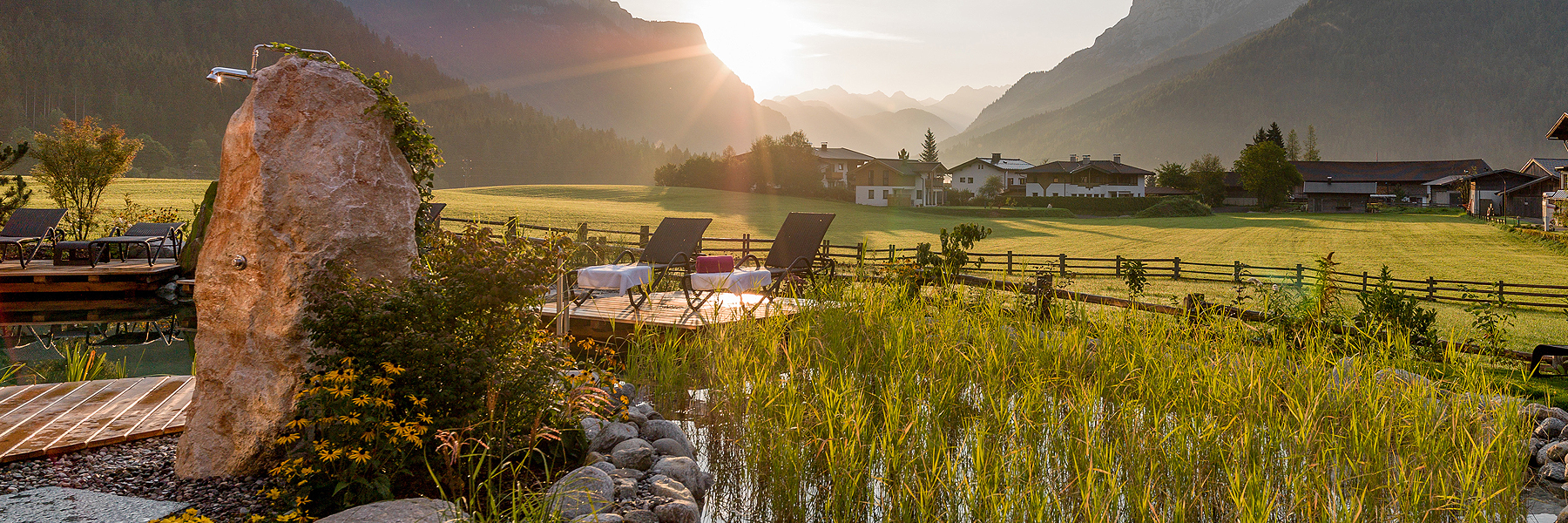 Wellnesslandschaft ruhe.alm mit Naturbadeteich